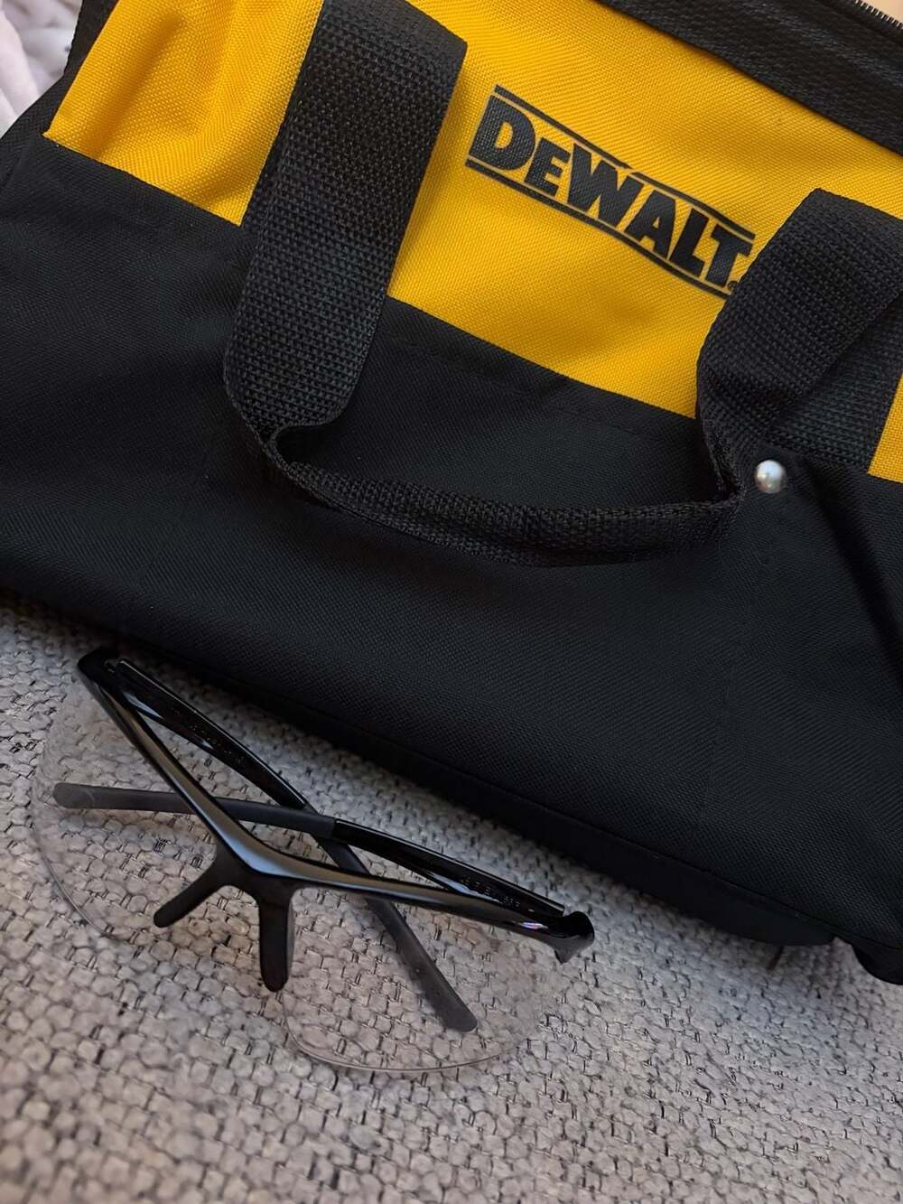DEWALT Heavy Duty Contractor Tool Bag Yellow and Black Nylon and safety glasses